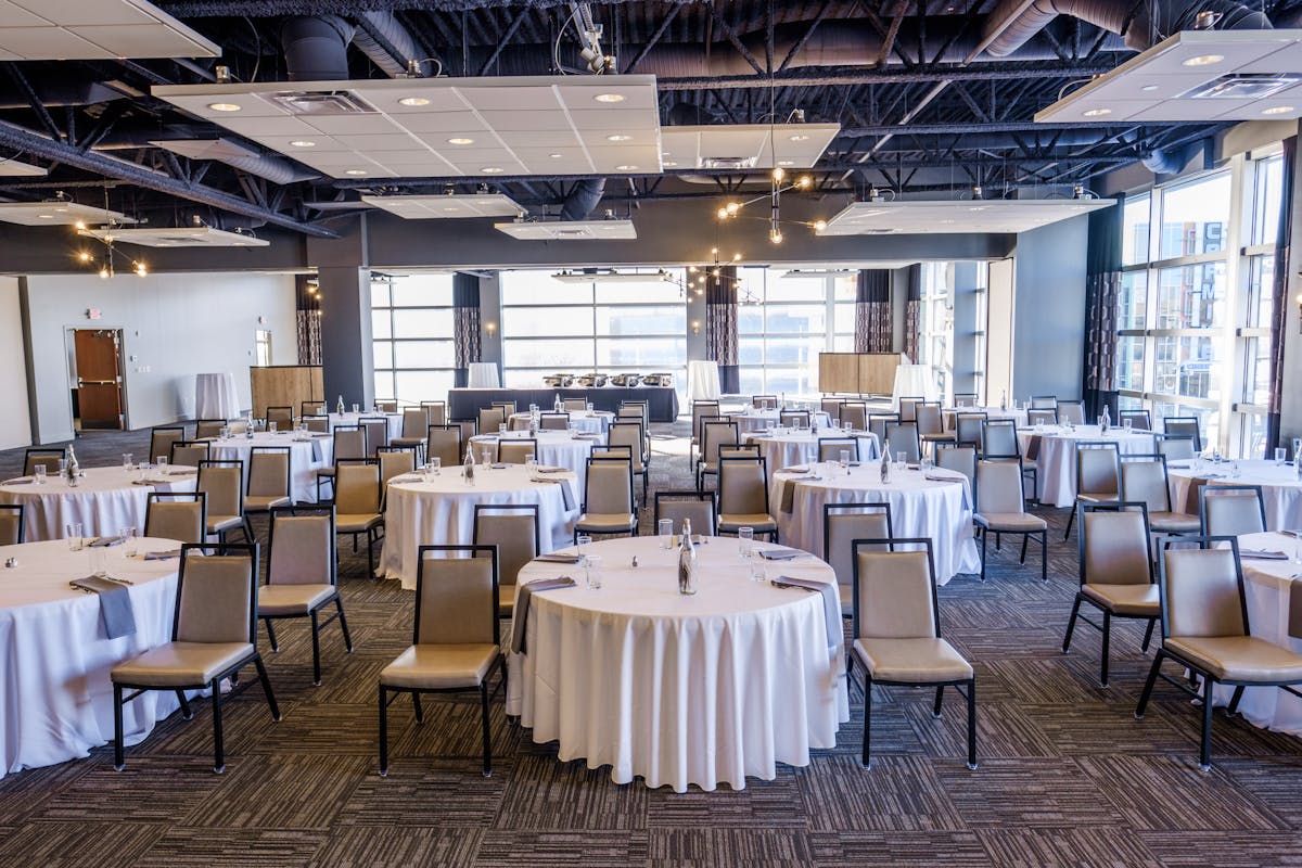 a large room with tables and chairs